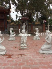 Tượng chú tiểu đá trắng nguyên khối