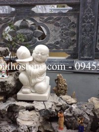 Tượng chú tiểu đá trắng nguyên khối