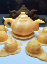 Bộ ấm trà đá ngọc hoàng long hình chiếc lá bộ 6ly.